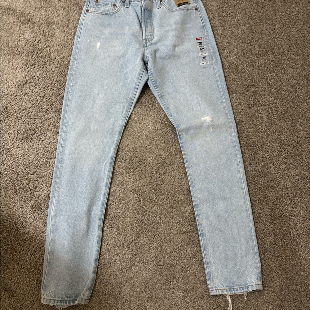 Levi's Light Blue Skinny Jeans with Distressed Rips and Frayed Hem
